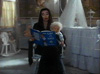 Morticia reading 'The Cat In The Hat'
