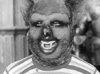 Pugsley in a werewolf mask